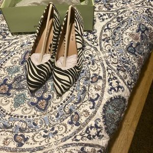 Zebra print jacket and pumps